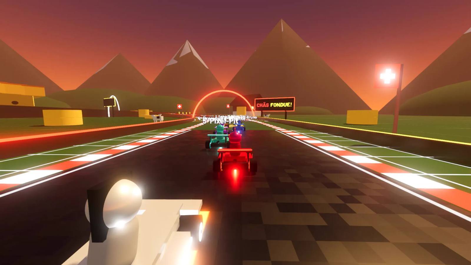 Kart-Rennen auf der Emmental-Strecke von Neon Racing Deluxe: Mini-Karts auf der Strasse vor Bergkulisse bei Sonnenuntergang, mit Kuhweiden und Leuchtbögen